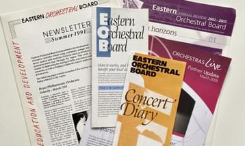 A collection of flyers and magazines for the EOB