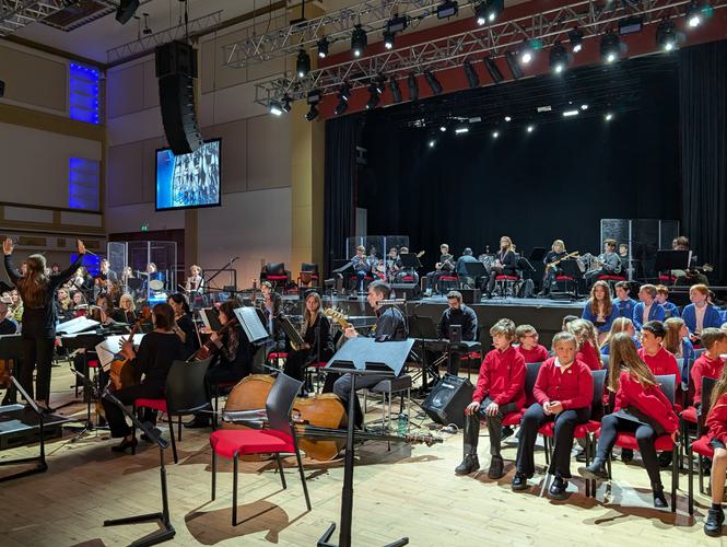 Close up of students performing on stage