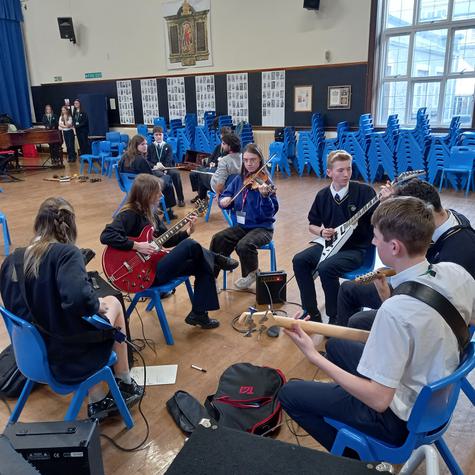 Group of students playing instruments