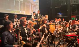 Large group of students playing instruments