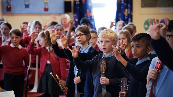 Group of school children singing