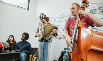 Love Stories participants playing instruments
