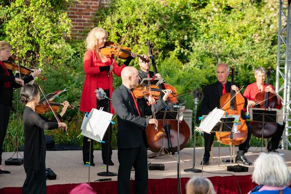 Musicians on stage playing instruments
