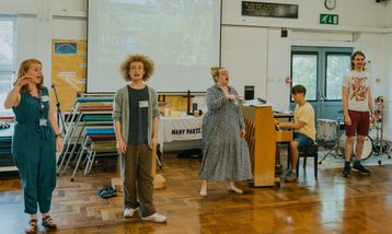 A group of student music leaders in a workshop