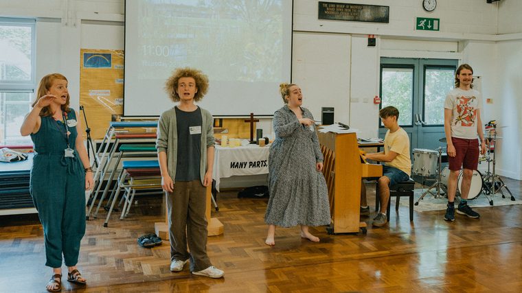 A group of student music leaders in a workshop
