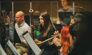 Members of the orchestra rehearse in The Venue at Leeds Conservatoire.