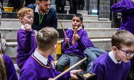 Group of students playing instruments