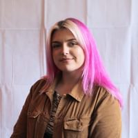 Headshot photo of Claire