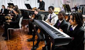 Young students playing instruments