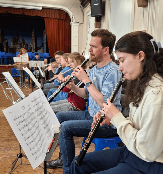 A group of young musicians playing during a Cumbria Calling rehearsal